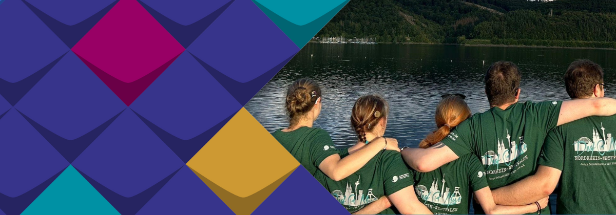 Fünf Menschen haben sich als Team untergehakt.